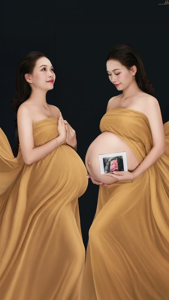 16 giây thành phẩm: mẹ bầu giữa sóng lụa vàng trên nền đen